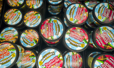 Pints of ice cream in a supermarket freezer