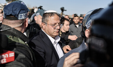 Close up of Itamar Ben-Gvir surrounded by people