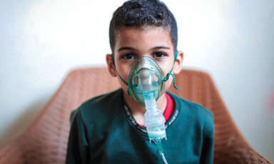 Boy using a nebuilizer