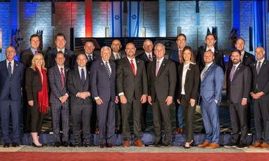Members of US congressional delegation stand with Knesset Speaker Amir Ohana