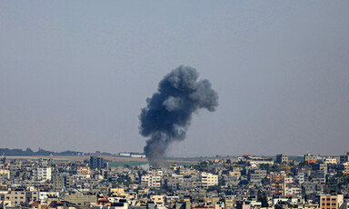 Smoke rising against the Gaza skyline 