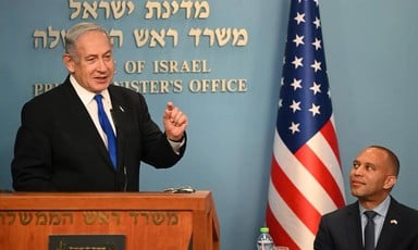 Congressman Hakeem Jeffries looks on as Prime Minister Benjamin Netanyahu speaks