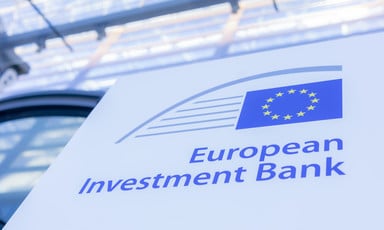 A large blue and white sign bearing the words European Investment Bank outside that institution's headquarters 