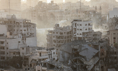 A view of damaged buildings following an Israeli airstrike on al-Rimal in Gaza City