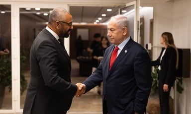 The British Foreign Secretary James Cleverly shakes hands with Israel's Prime Minister Benjamin Netanyahu