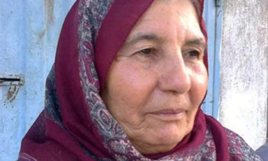 A portrait of a woman wearing a headscarf 