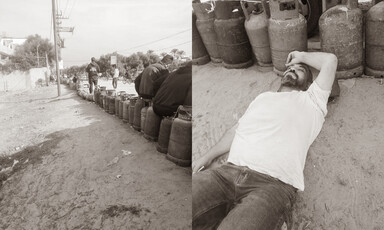 A row of gas canisters stretches into the distance, and a man lying on the ground next to the canisters