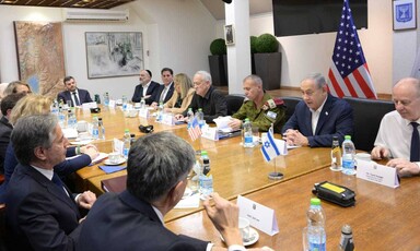 A group of men at a conference table