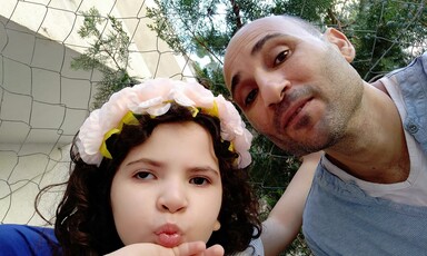 A girl with her father