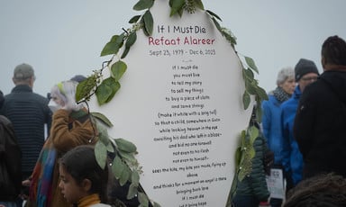 A placard containing the words of the poem If I Must Die 