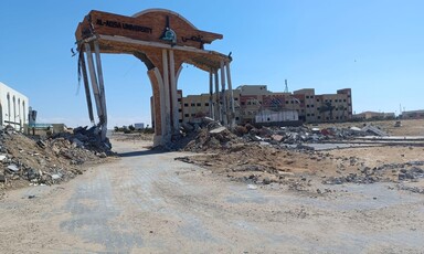 The largely destroyed arches at the entrance to Al-Aqsa University in southern Gaza