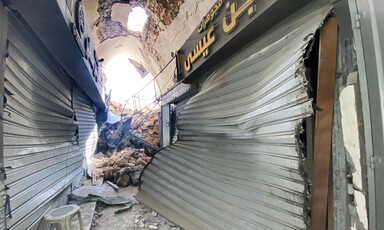 The remains of shops in a gold market following an Israeli attack 