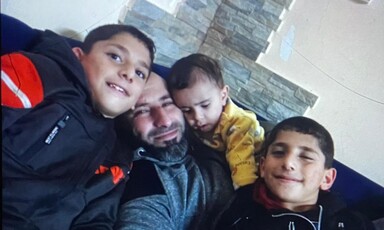 A man with three children