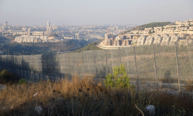 A barbed wire fence erected by Israel on occupied Palestinian land 