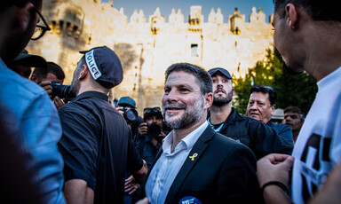 A man smiles gormlessly outside Jerusalem's Old City