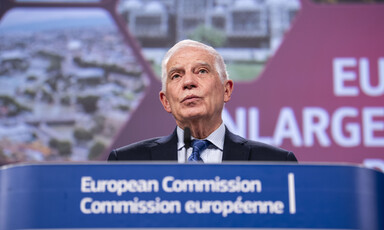 European Union Foreign Policy Chief Josep Borrell stands at a podium with the words European Commission written on it