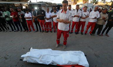 Medics gather for a funeral 