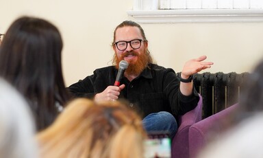 A man speaking into a microphone