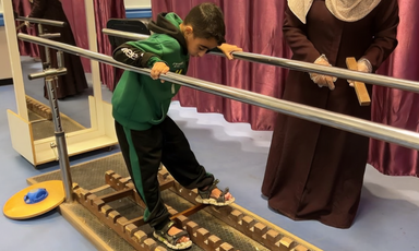 A boy gets physio