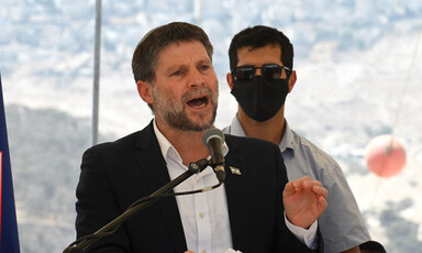 A man speaks into a microphone